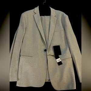 X-SUIT NEVER BEFORE WORN!